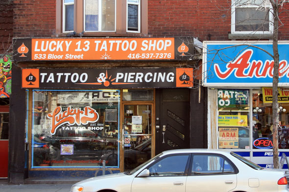 Lucky 13 Tattoos Lucky 13 Tattoo Shop is hard to miss near the corner of