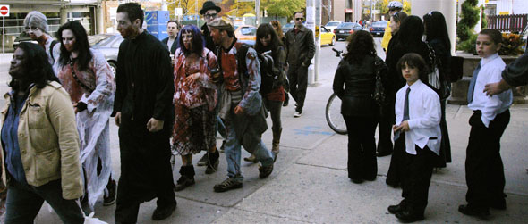Toronto Zombie Walk 2008 passes by a funeral home