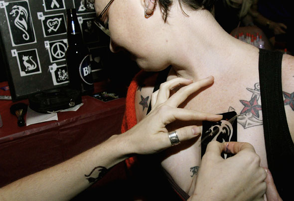 Sparkulz temporary tattoos are applied during Zack Taylor's Winterbash party in Toronto