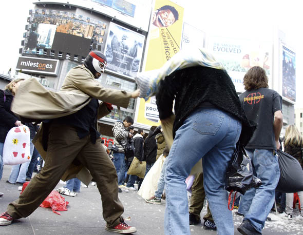 Saajid Motala dressed in a Mexican wrestling mask during the pillow fight in Yonge-Dundas Square in Toronto 2009