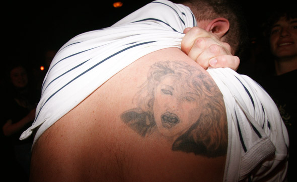 <br />One Madonna fan shows off his tattoo at the Can't Stop Esther Madonna party at The Phoenix in Toronto