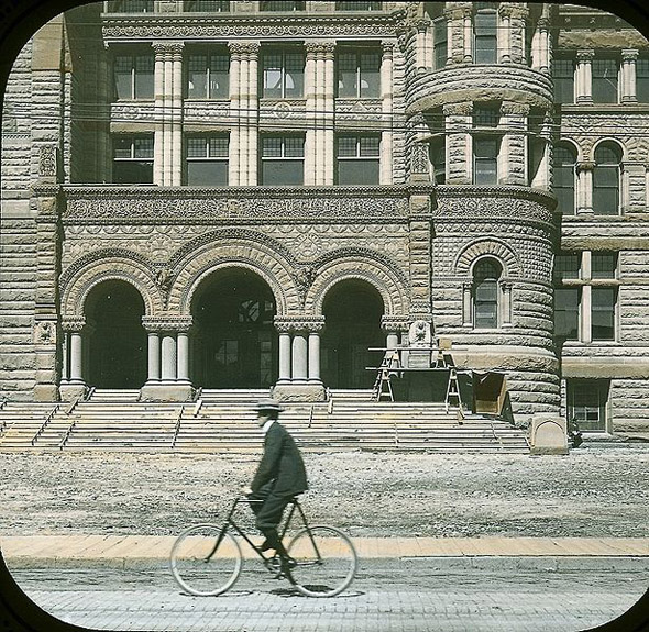 20110103-1899-Cyclist_passing_city_hall.jpg